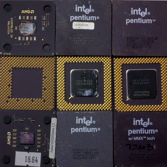 CPU processor ceramic computer processors from Intel / AMD with gold-plated contacts. heat sinks are removed.